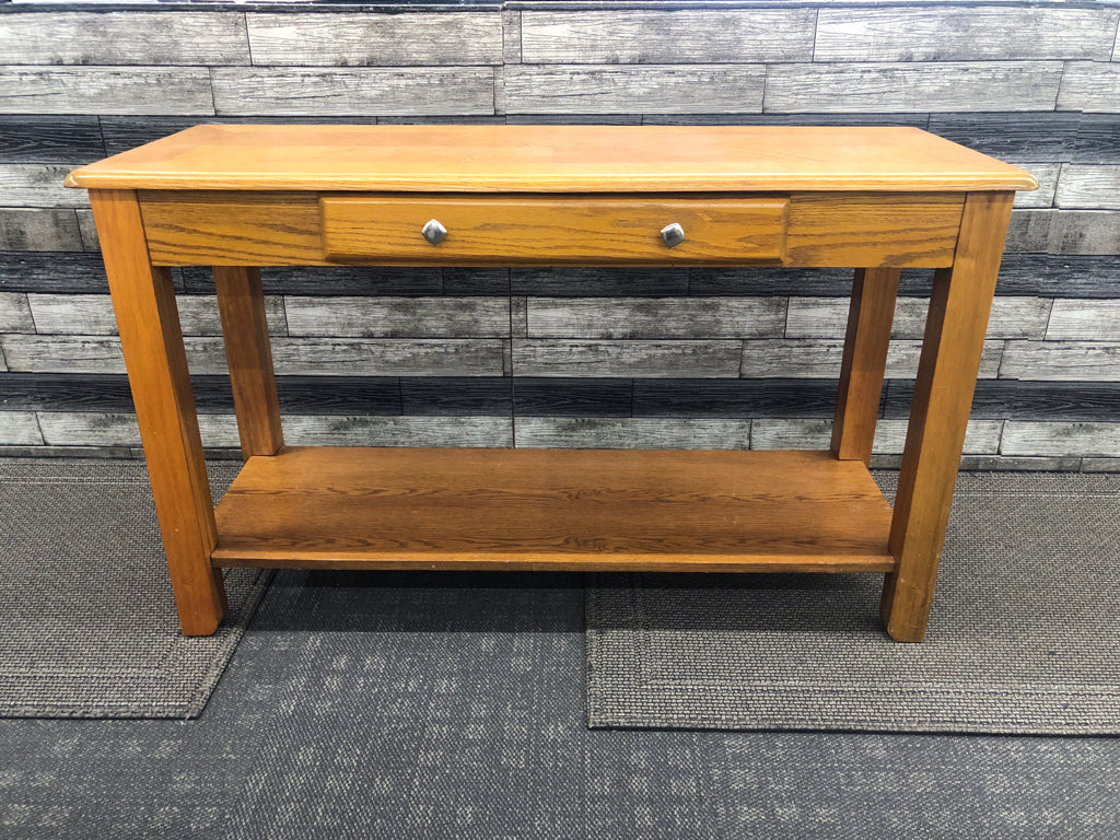 OAK WOOD CONSOLE TABLE W BOTTOM SHELF AND 1 DRAWER.