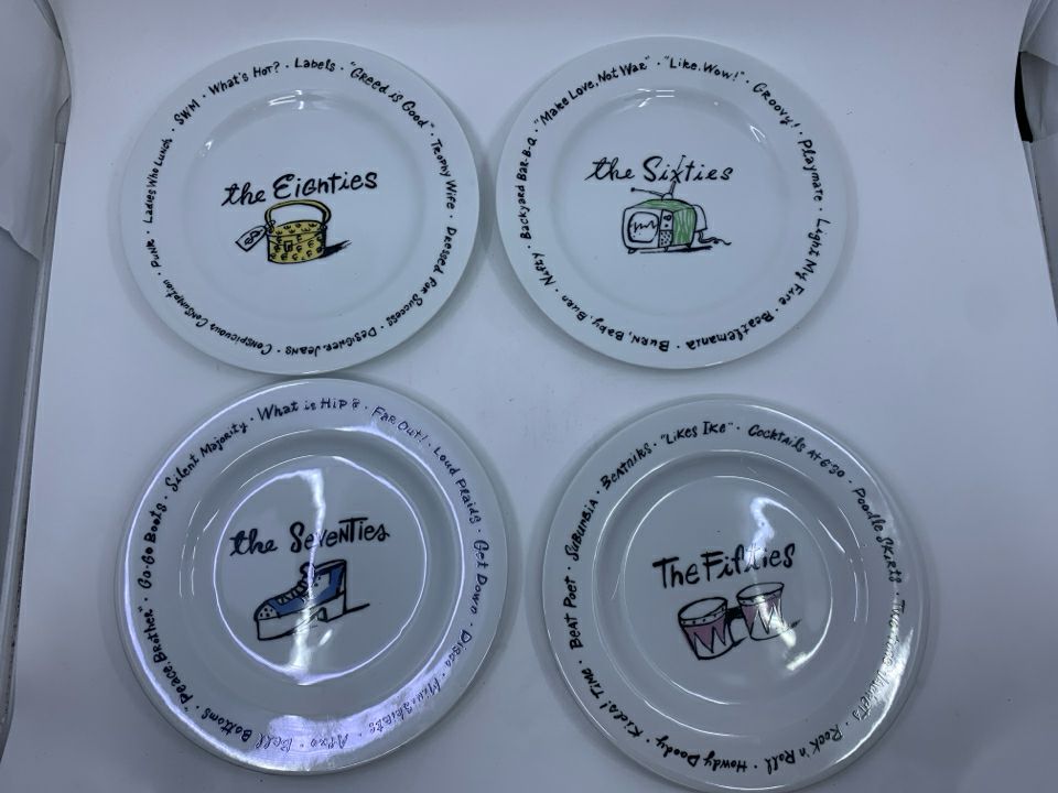 12 POTTERY BARN MILLENNIUM DECADES PLATES.