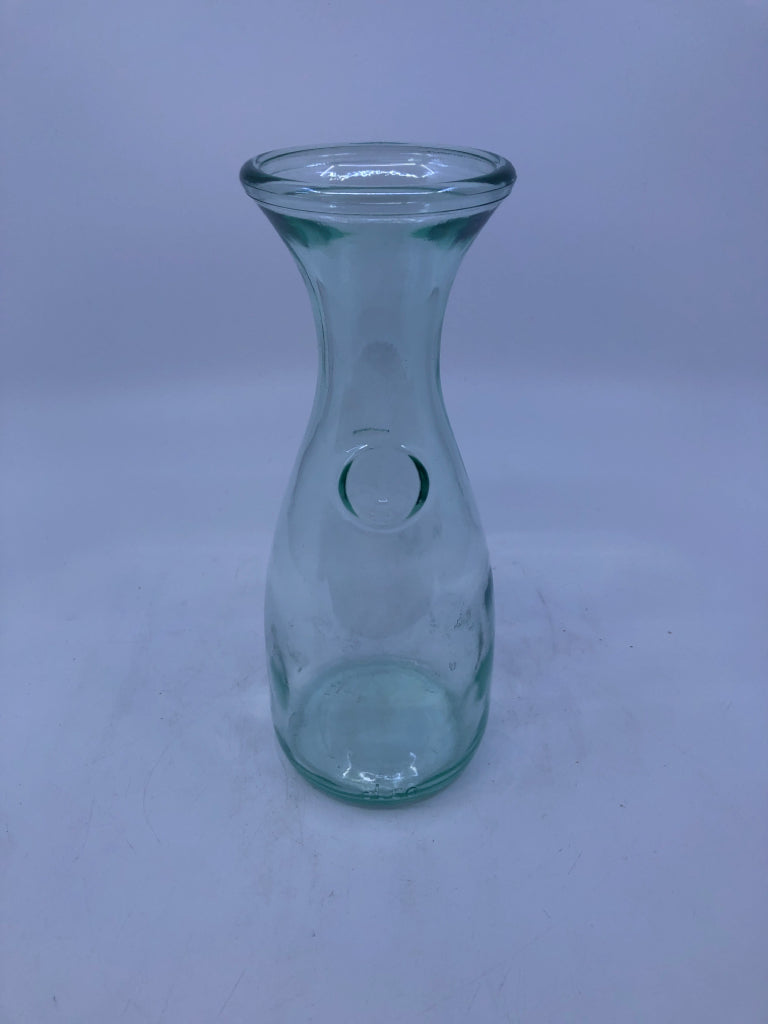 GREEN TINTED GLASS BOTTLE.