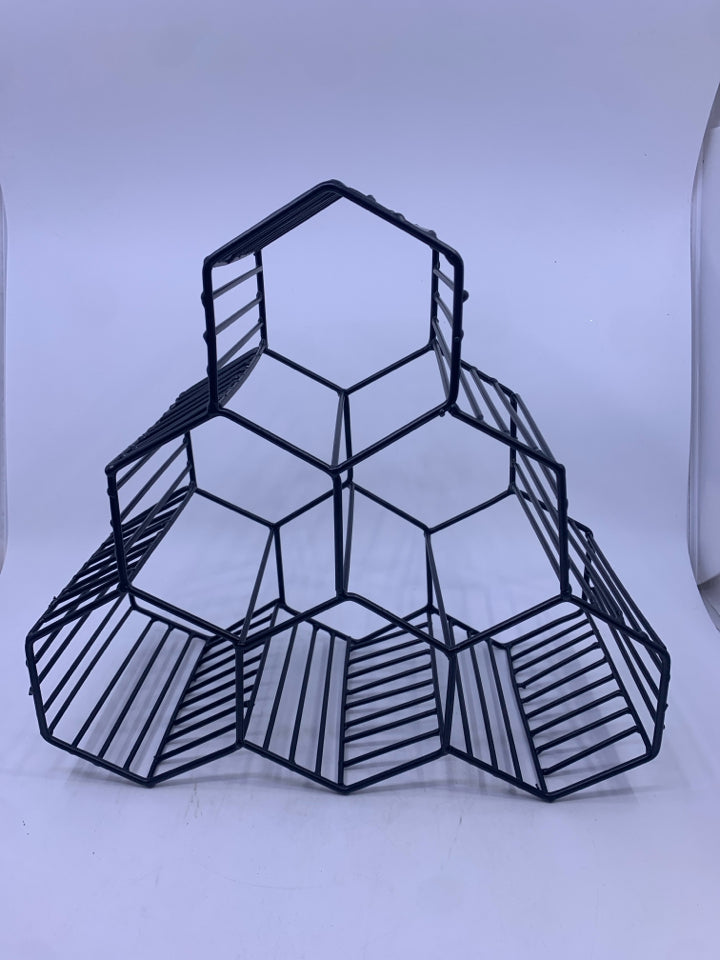 BLACK METAL OCTAGON SHAPED WINE RACK.