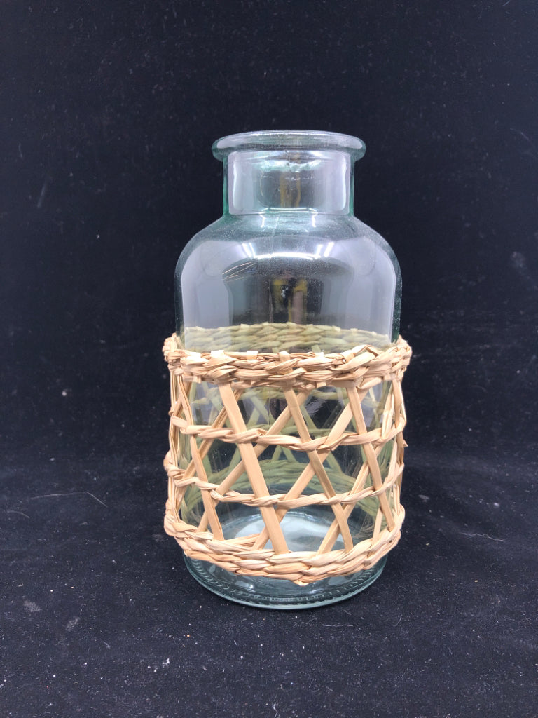 TINTED GREEN GLASS VASE W/ WOVEN BOTTOM.