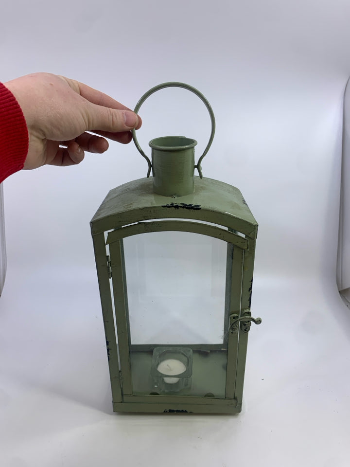 GREEN METAL LANTERN.