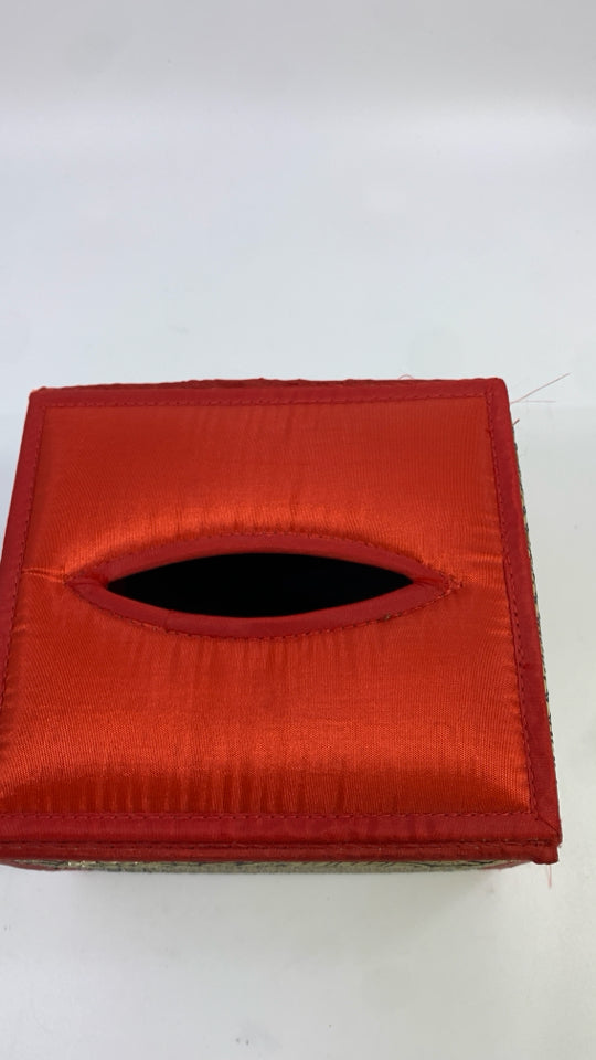 RED FABRIC W/STITCHED ELEPHANTS TISSUE COVER.