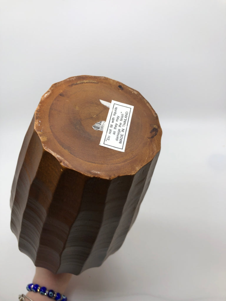 TEXTURED WOODEN VASE.