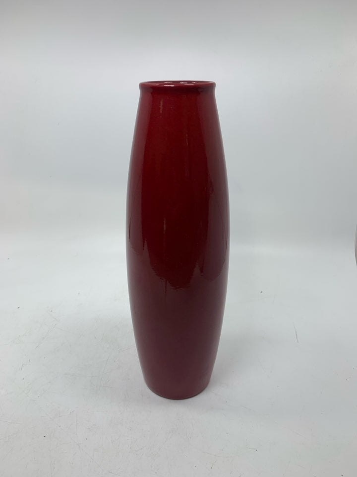 DARK RED CERAMIC VASE.