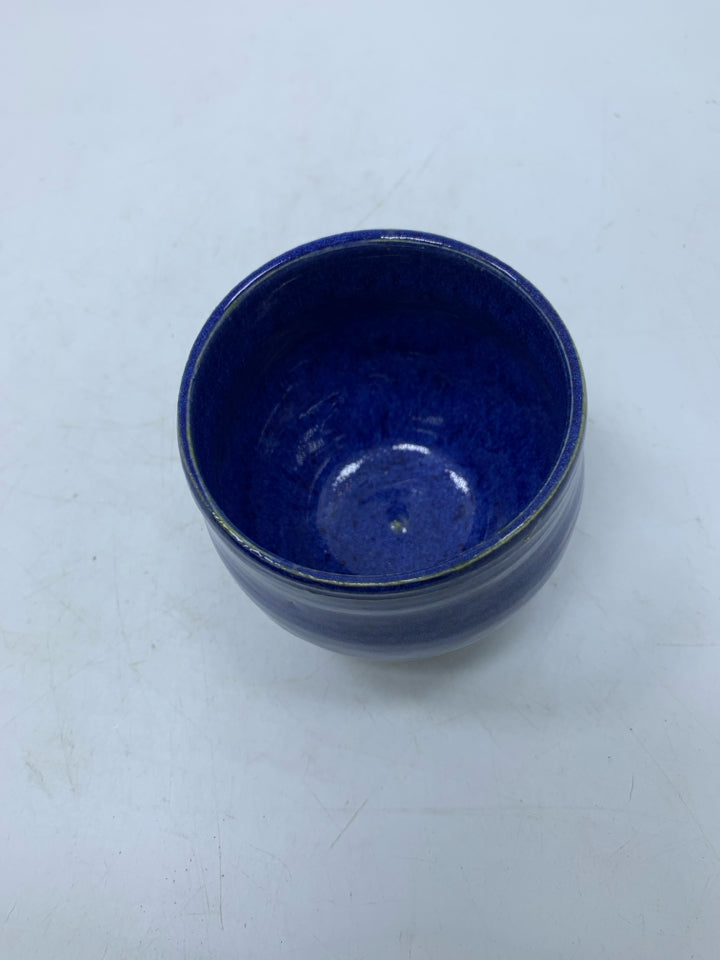 ELECTRIC BLUE SHORT POTTERY VASE.