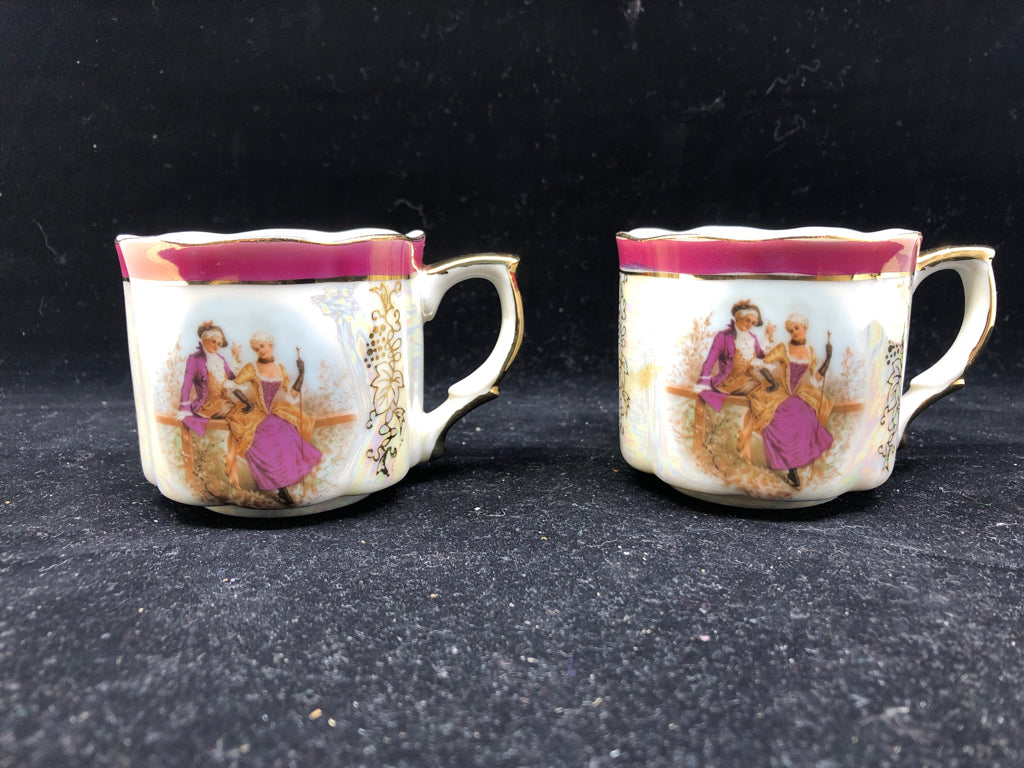 2 VTG SMALL TEA CUPS W/VICTORIAN COUPLE.