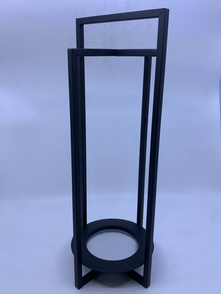 BLACK METAL JAR CANDLE HOLDER.