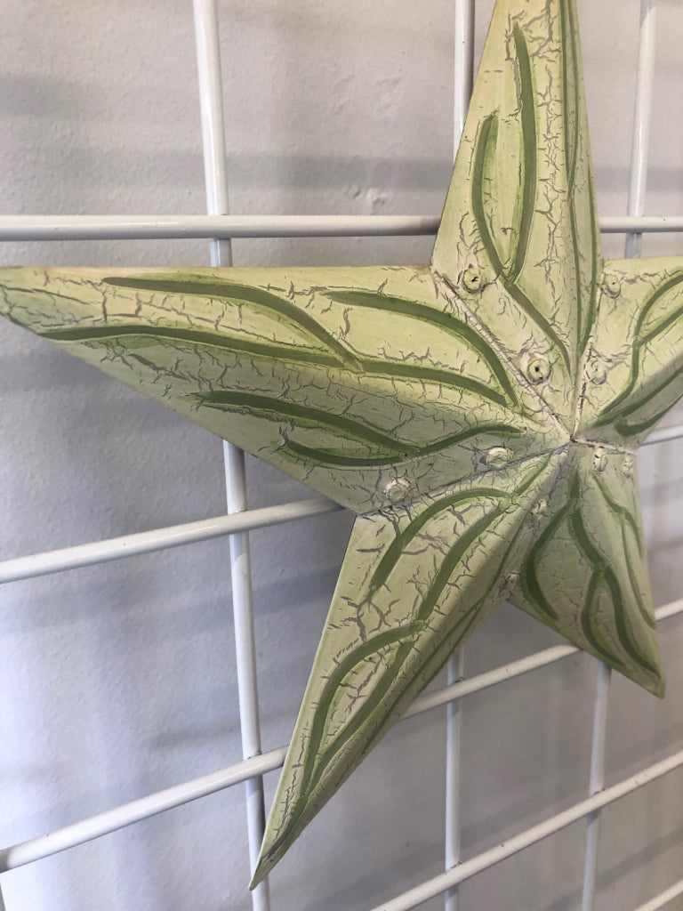 CREAM PAINTED STAR WALL HANGING.