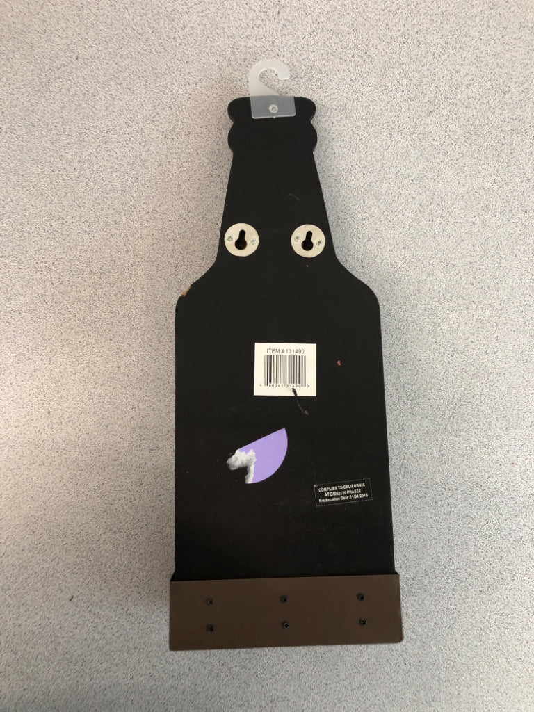 MAN CAVE BOTTLE OPENER WALL HANGING.