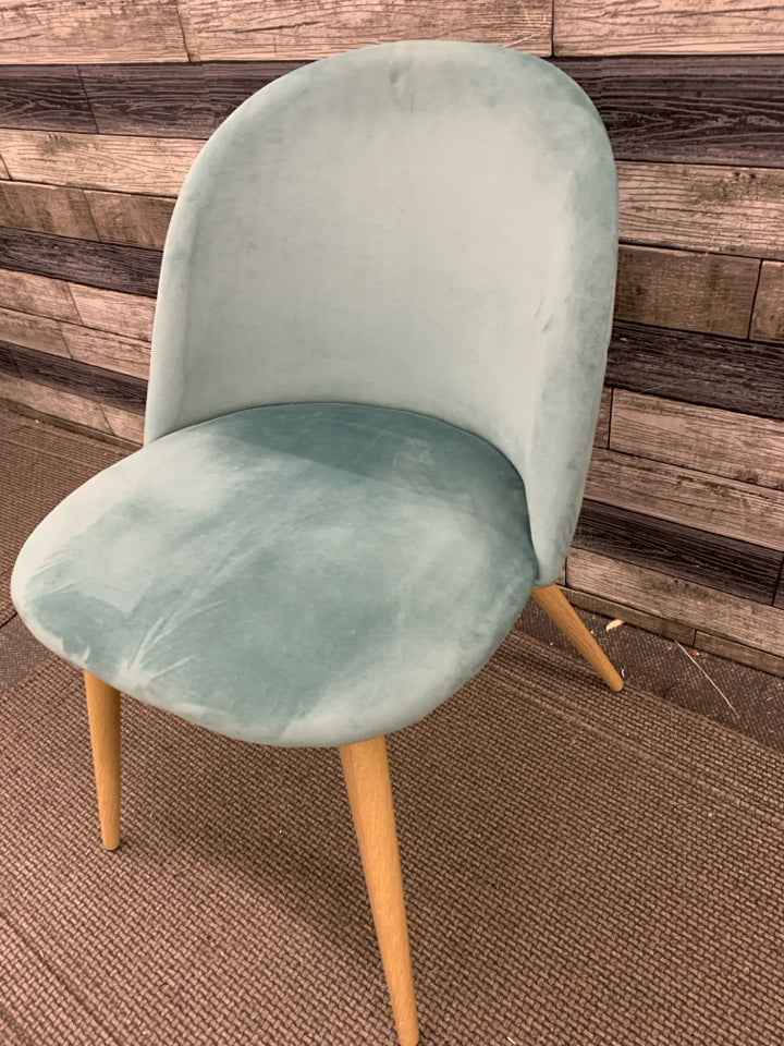 MINIMALIST SOFT BLUE CHAIR.