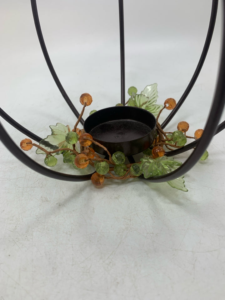 METAL PUMPKIN TEA LIGHT HOLDER.