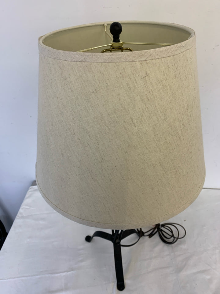 BLACK SCROLL BASE LAMP W TAN/CREAM SHADE.