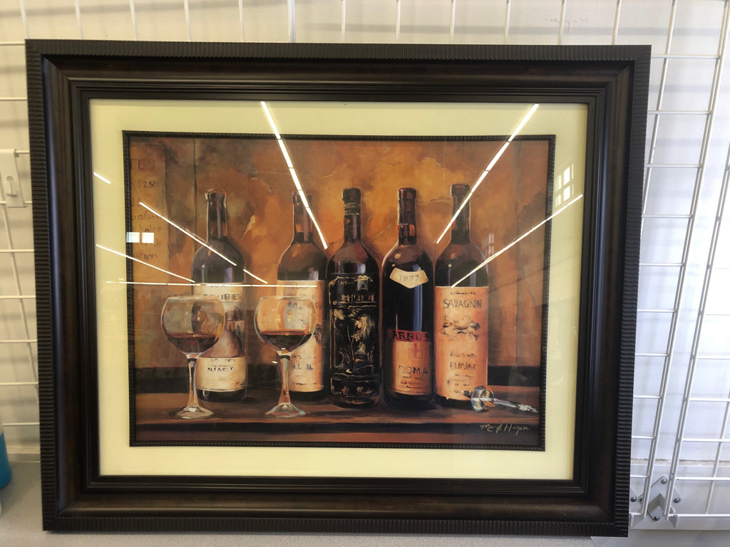 WINE BOTTLES PRINT IN DK WOOD FRAME.