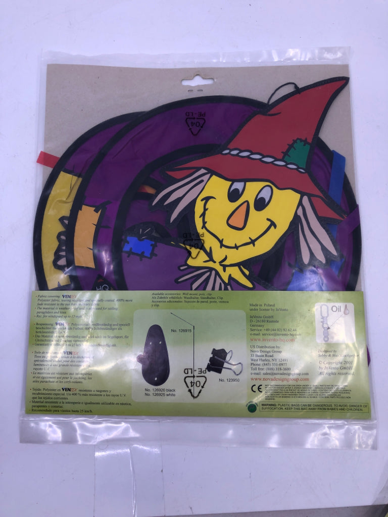 NIP SCARECROW SPIRAL WIND SPINNER.