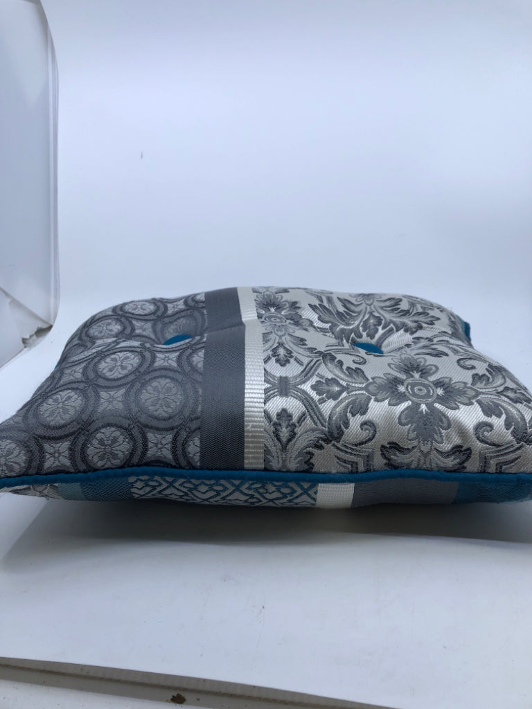TEAL AND GREY REVERSIBLE PILLOW.