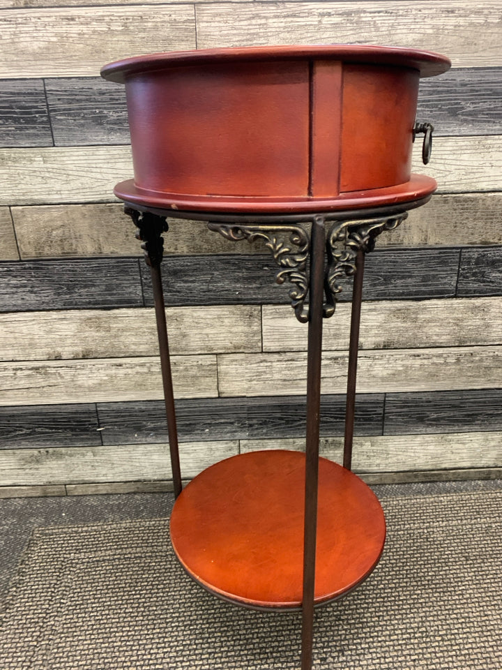 VTG ROUND RED WOOD END TABLE W/ DRAWER.