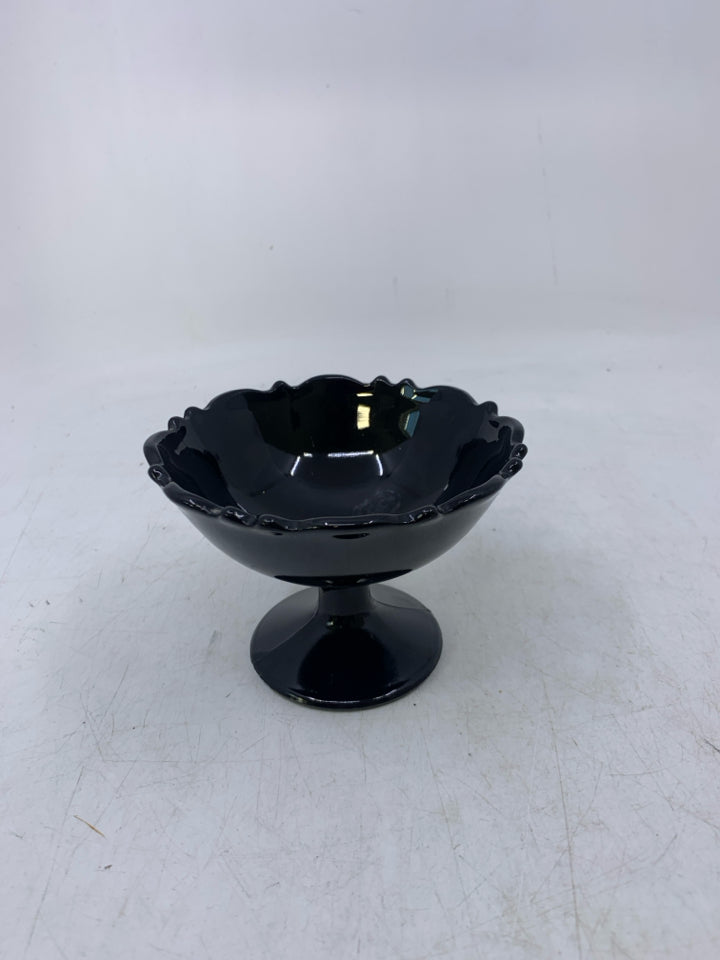 FOOTED SMALL BLACK GLASS BOWL.