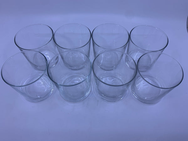 8 CLEAR JUICE GLASSES.