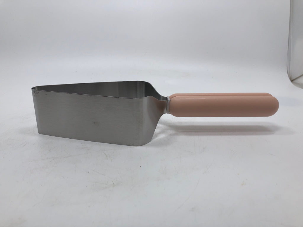 NIP PINK HANDLE CAKE SLICER.