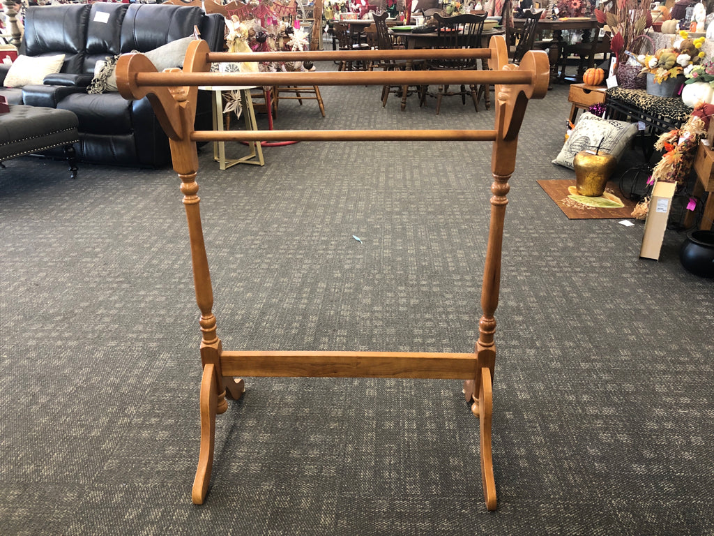 BLONDE WOOD BLANKET RACK.