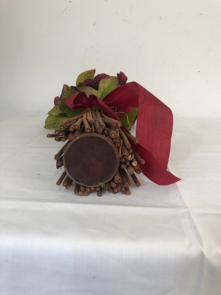 MAROON COLORED FAUX FLOWERS W RED BOW.