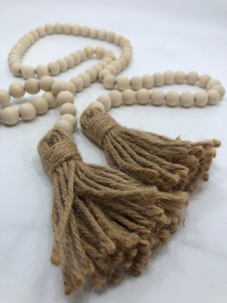 WOOD BEAD GARLAND W/TASSELS.