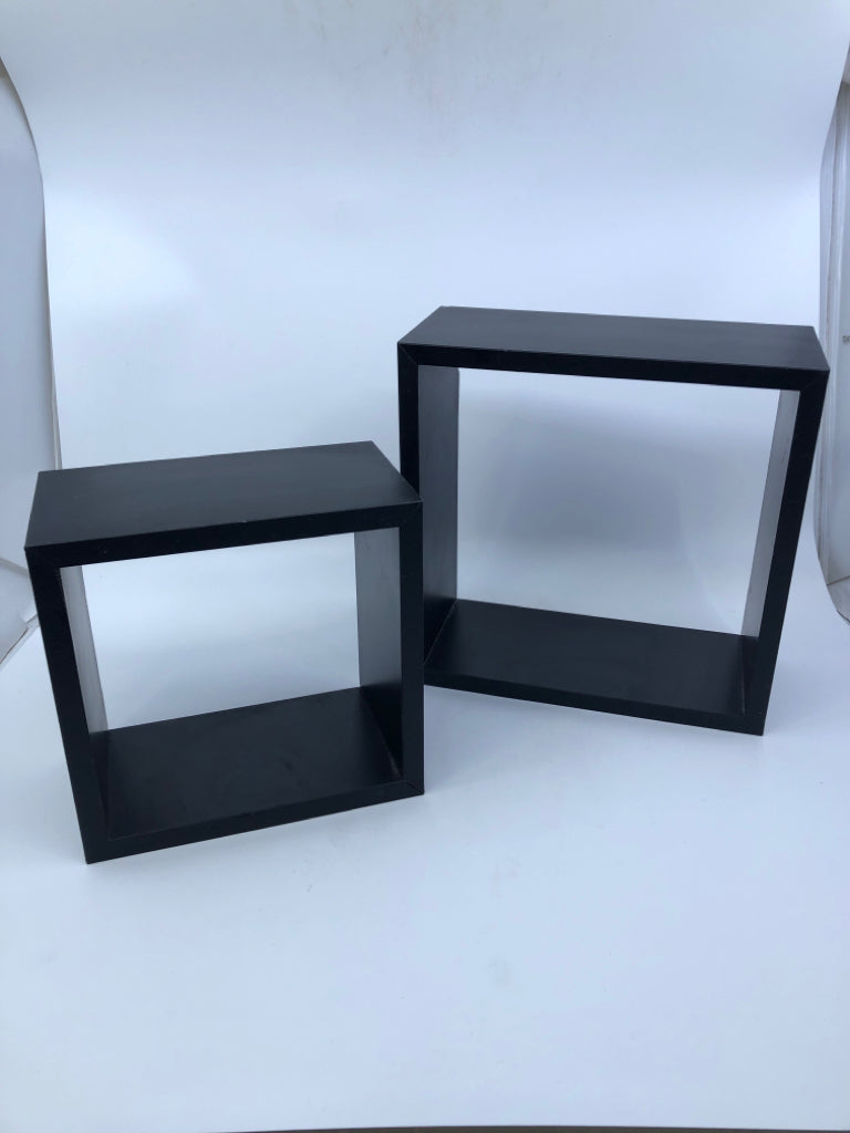 2 BLACK WALL HANGING CUBES.