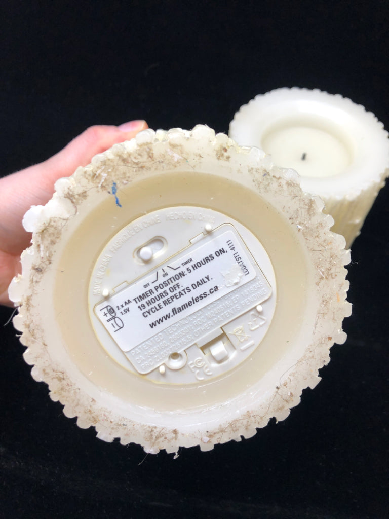 2 BIRCH FLAMELESS CANDLES.