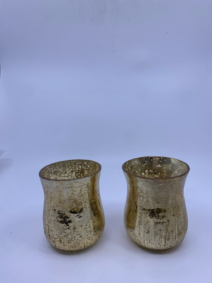 2 GOLD MERCURY GLASS CANDLE HOLDERS.