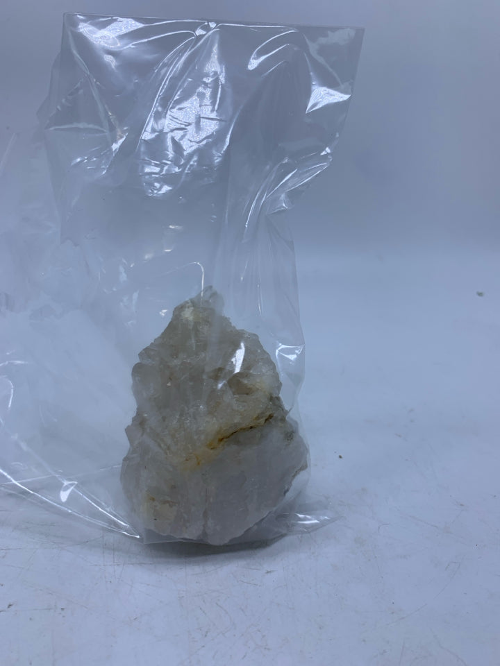 WHITE CRYSTAL CHUNK IN BAG.