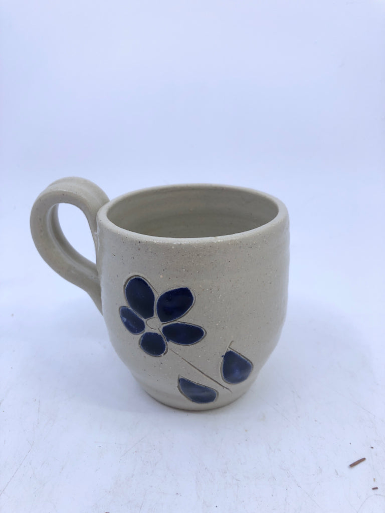 POTTERY MUG W BLUE FLOWER.