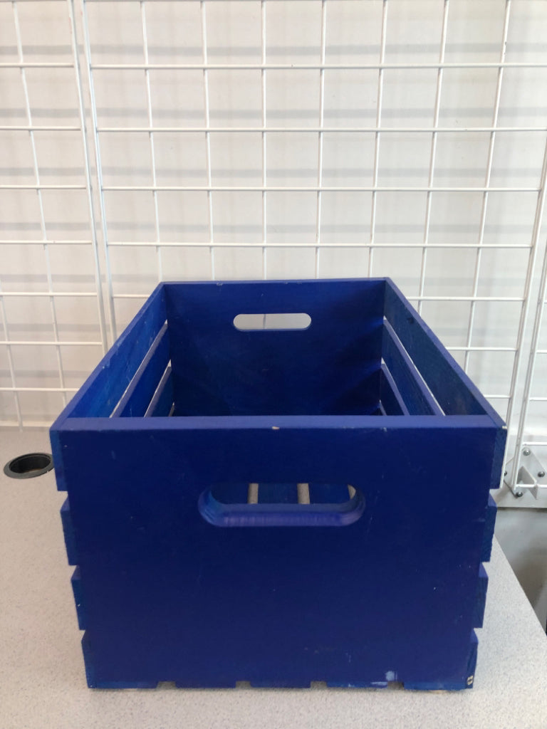 BLUE WOODEN CRATE.