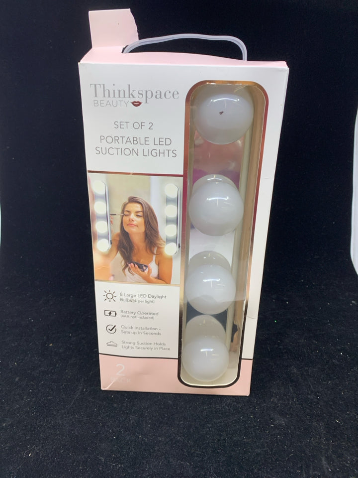 NIB PORTABLE SUCTION LIGHTS.