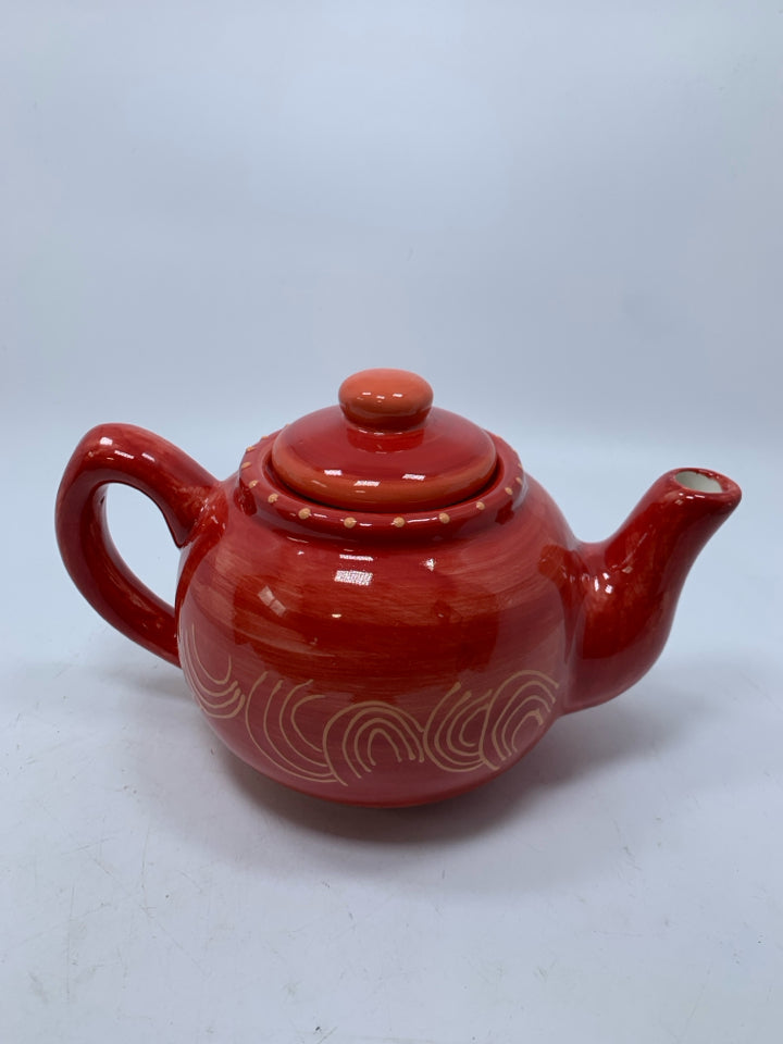 RED CERAMIC TEAPOT W/ ORANGE LINES.