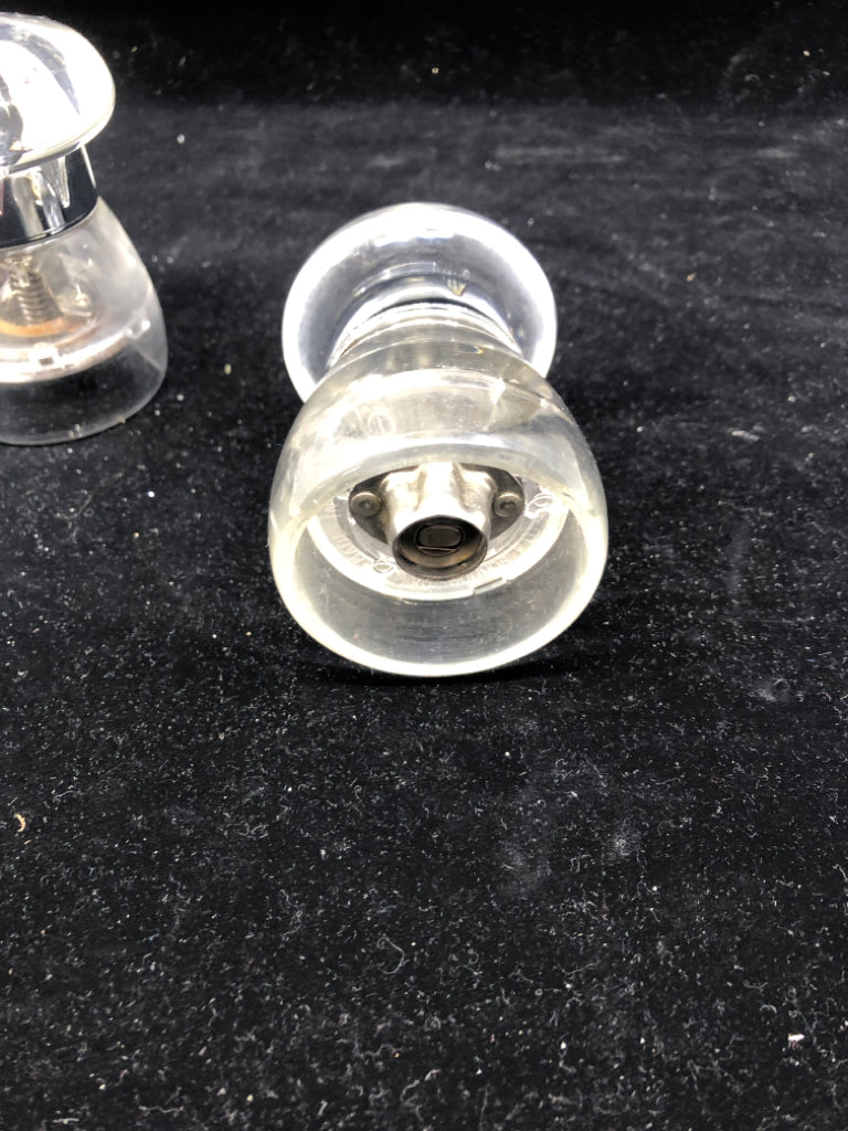 CLEAR PLASTIC S AND P SHAKERS.