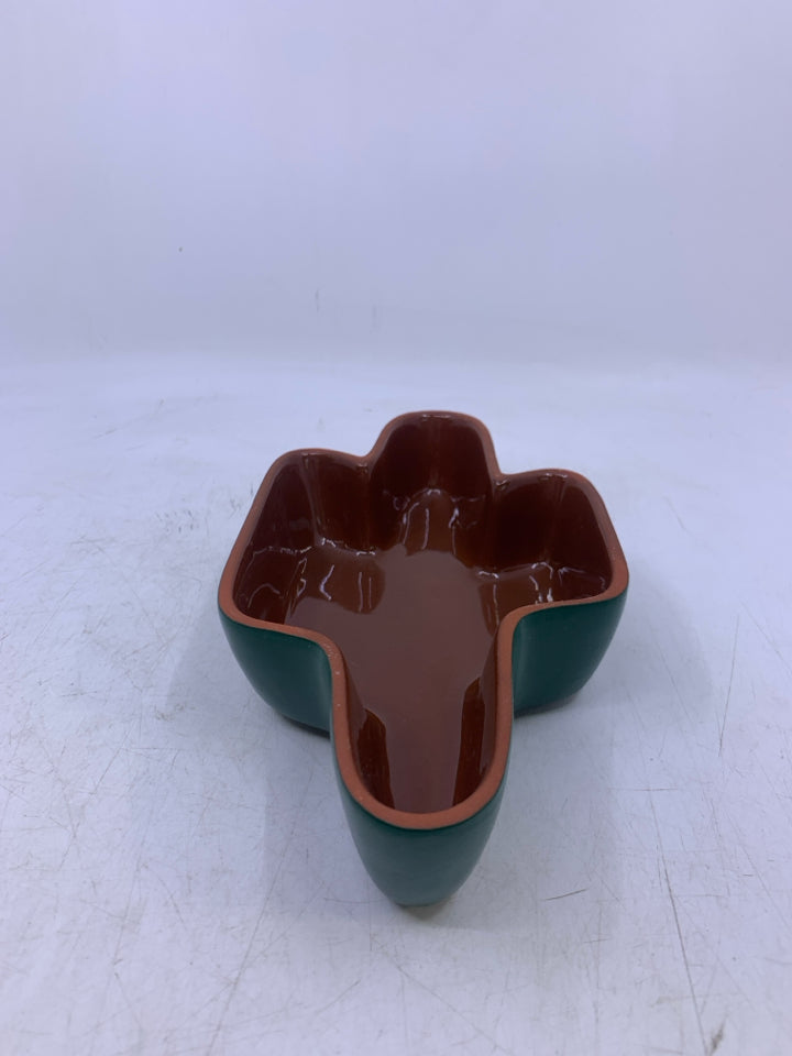 GREEN W/ BROWN INSIDE CACTUS SHAPED BOWL.