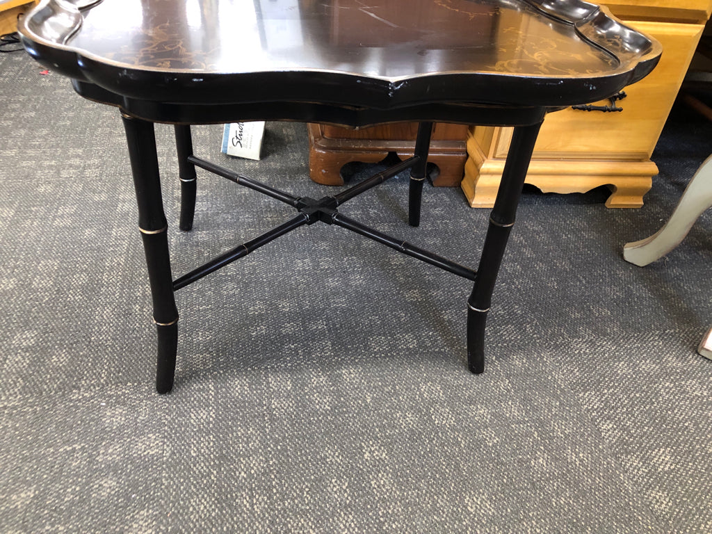 DARK BROWN TRAY TABLE W/ GOLD DETAILS.