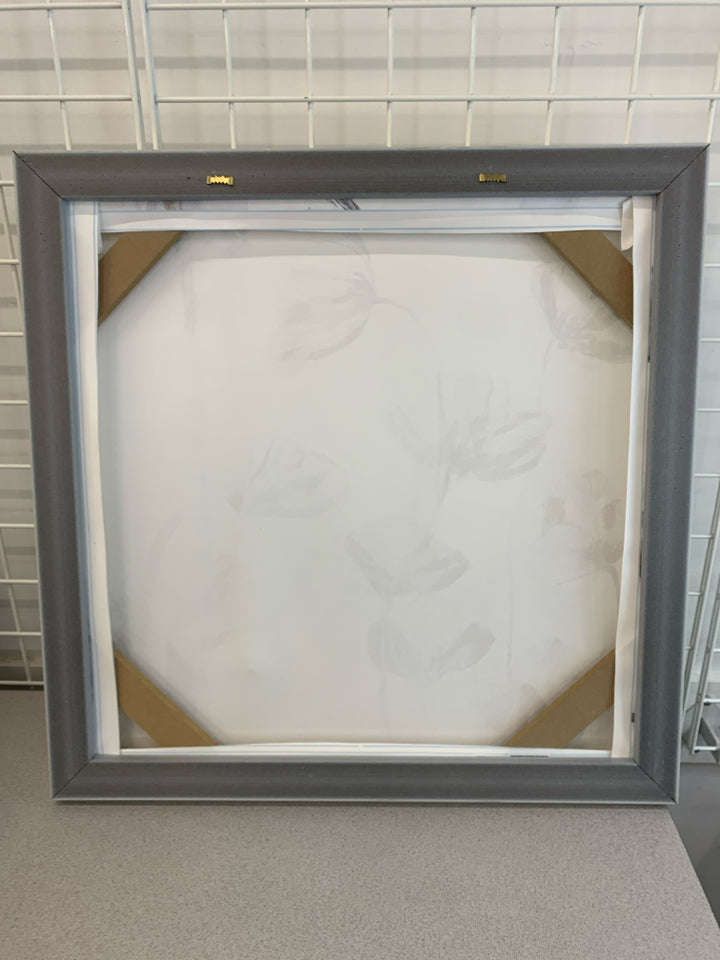 MANY B&W FLORALS ON FRAMED CANVAS W/GOLD DETAILS.