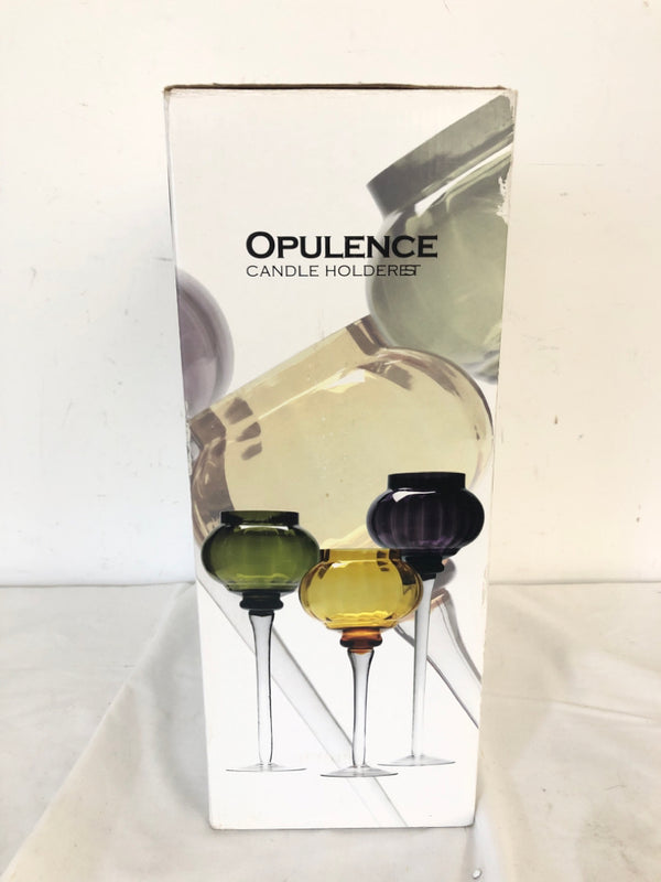 NIB OPULENCE CIRCLE CANDLE HOLDERS.