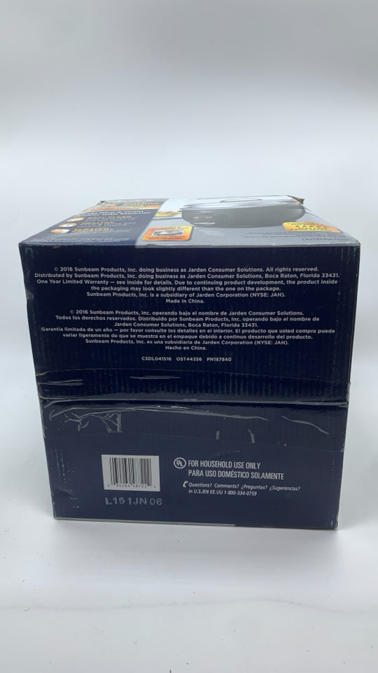 NIB OSTER RICE/GRAIN COOKER.