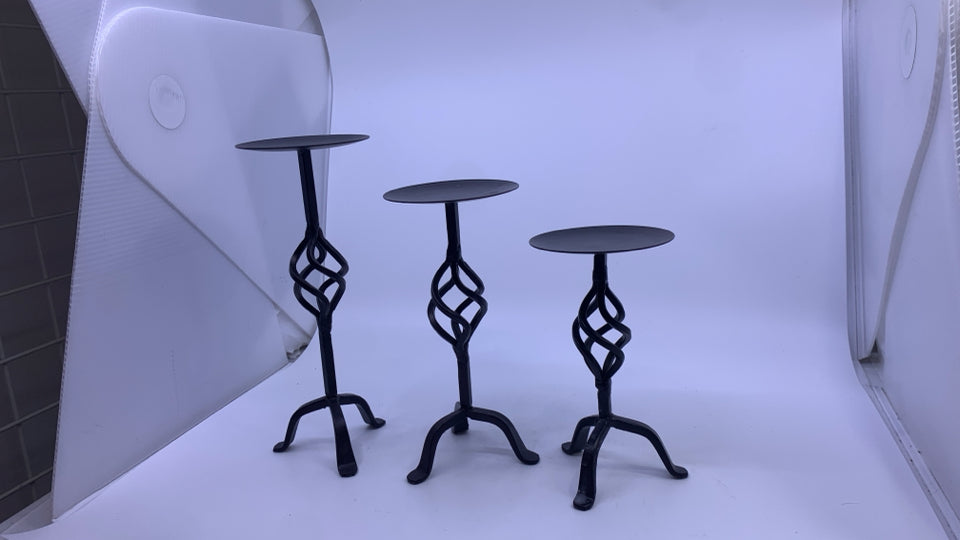 3 METAL SCROLL PILLAR CANDLE HOLDERS.