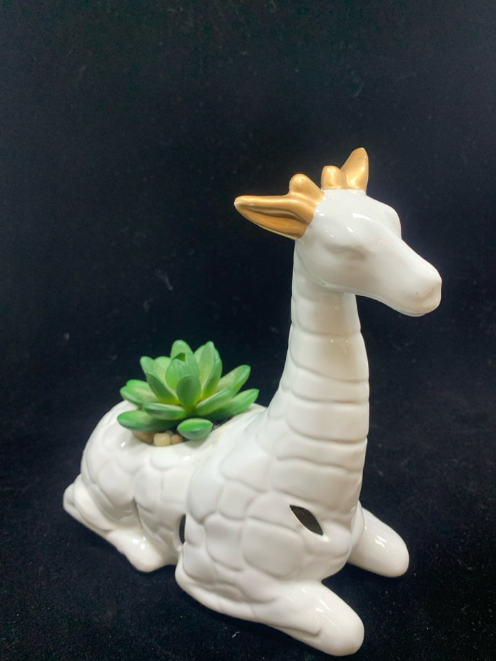 FAUX SUCCULENT IN WHITE CERAMIC GIRAFFE.