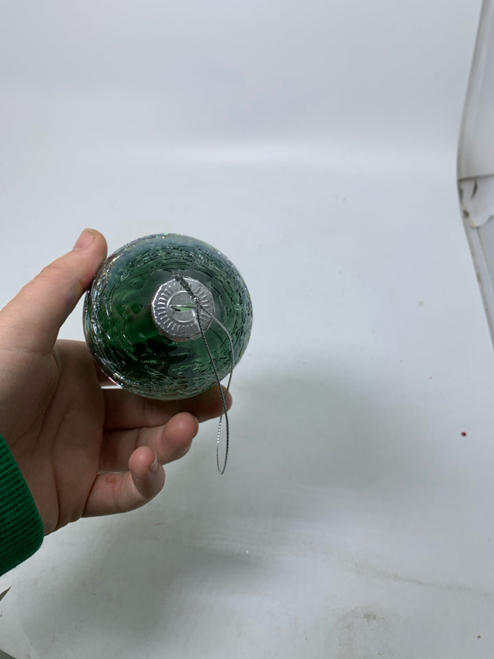 OIL SLIK TEXTURE BLOWN GLASS ORNAMENT.