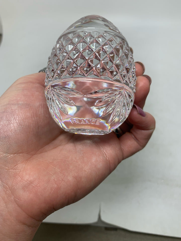 HEAVY GLASS TEXTURE EGG ON METAL STAND.