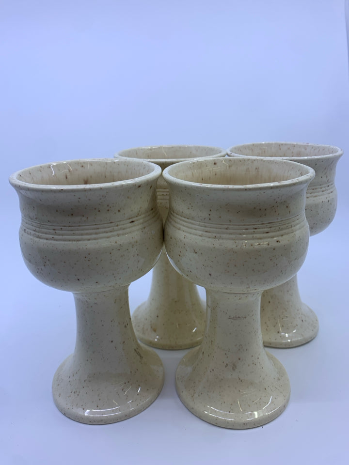 4 CREAM W/ SPECKLES POTTERY GOBLETS.
