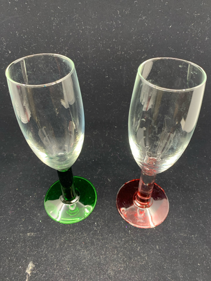 4 GLASSES W/ GREEN & RED STEMS.