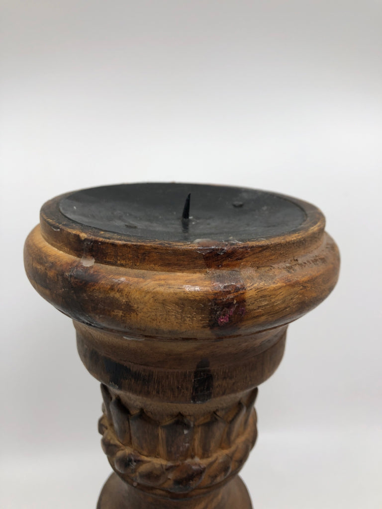 2 WOOD CARVED CANDLE HOLDERS W/BURNT FINISH.