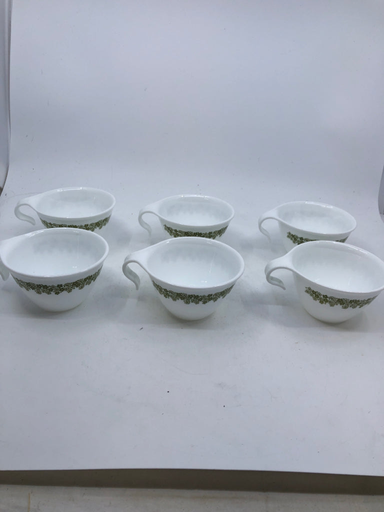 6 CORELLE GREEN FLOWER CUPS W/ CURVED HANDLE.