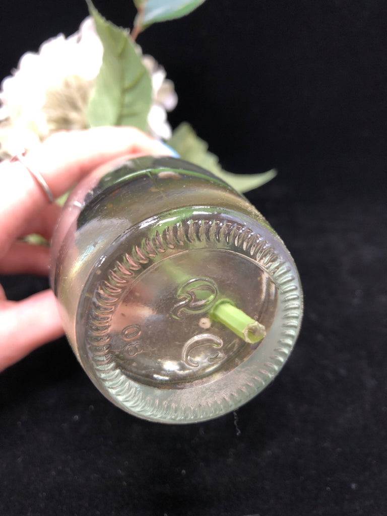 FAUX WHITE HYDRANGEA IN CLEAR GLASS BOTTLE.